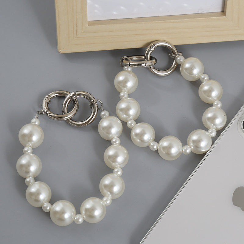 Classic Pearl Charm Strap – Elegant Glossy Beads for iPhone Case, Fashion Accessory | FAMAKA
