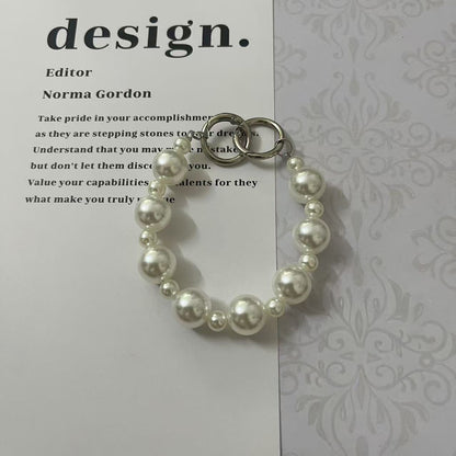 Classic Pearl Charm Strap – Elegant Glossy Beads for iPhone Case, Fashion Accessory | FAMAKA