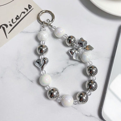 Metallic Bow & Heart Charm Strap – Silver Glossy Beads with Cute Accents | FAMAKA
