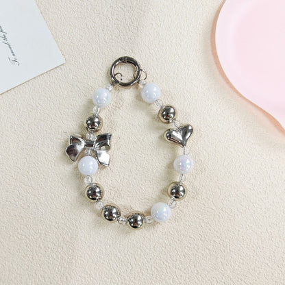 Metallic Bow & Heart Charm Strap – Silver Glossy Beads with Cute Accents | FAMAKA